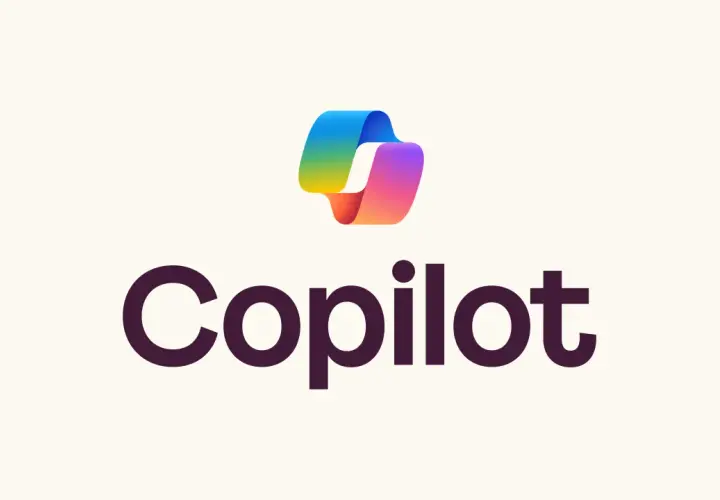Logo Microsoft Copilot z tęczowym symbolem i napisem "Copilot".