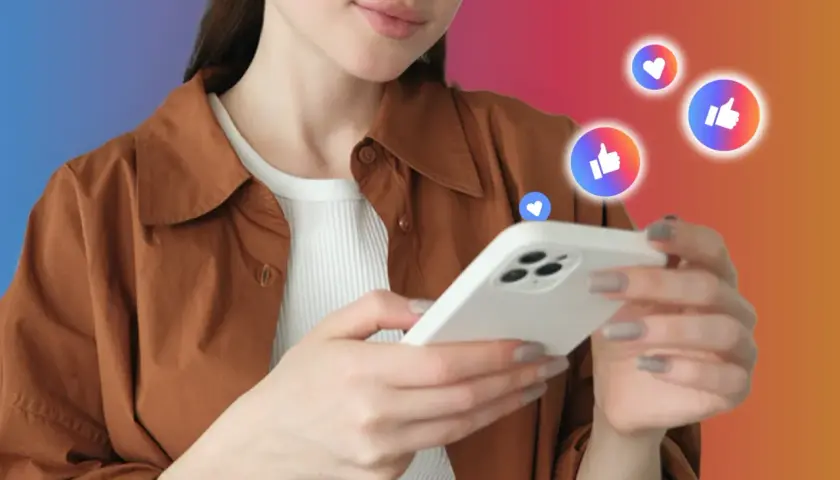Kobieta z telefonem, wokół niej serduszka i kciuki w górę – idealny przykład viral marketing.